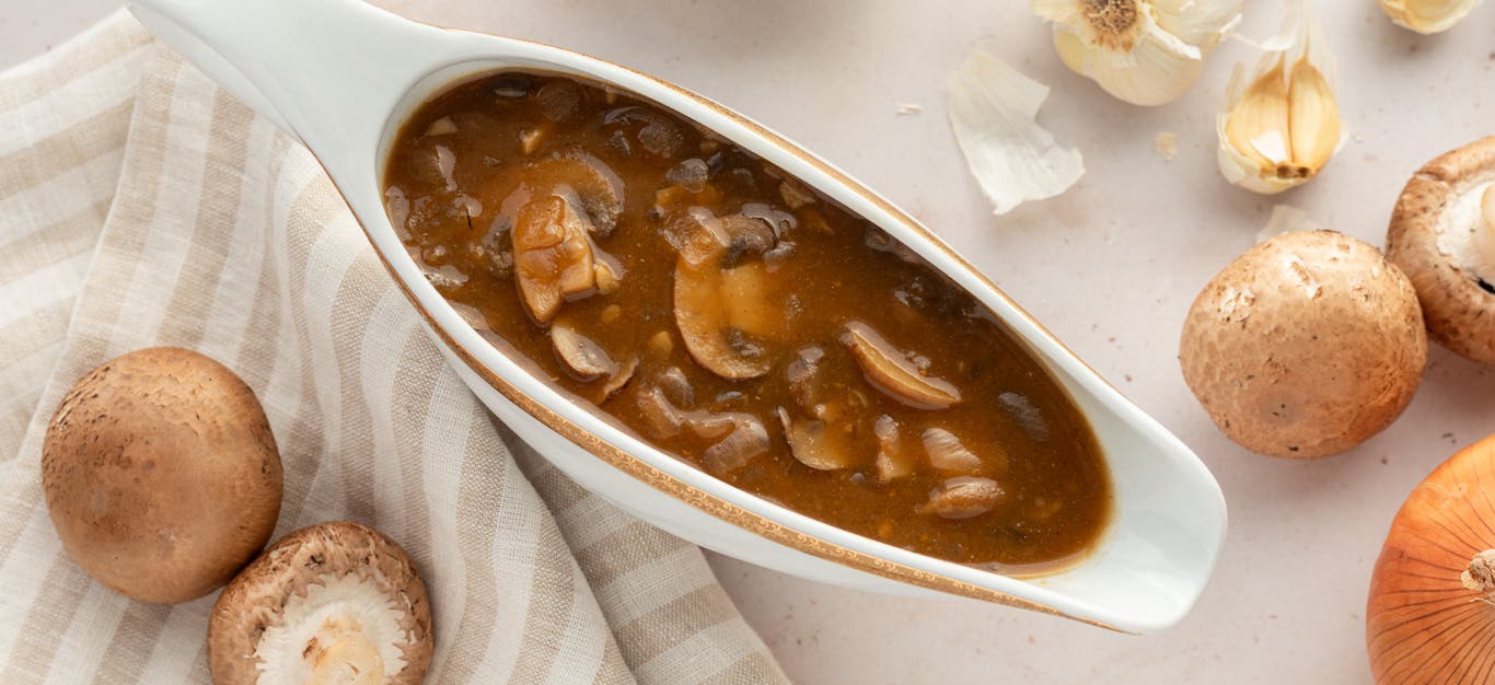 Mommy's Mushroom Gravy 3.0 in a white porcelain gravy boat