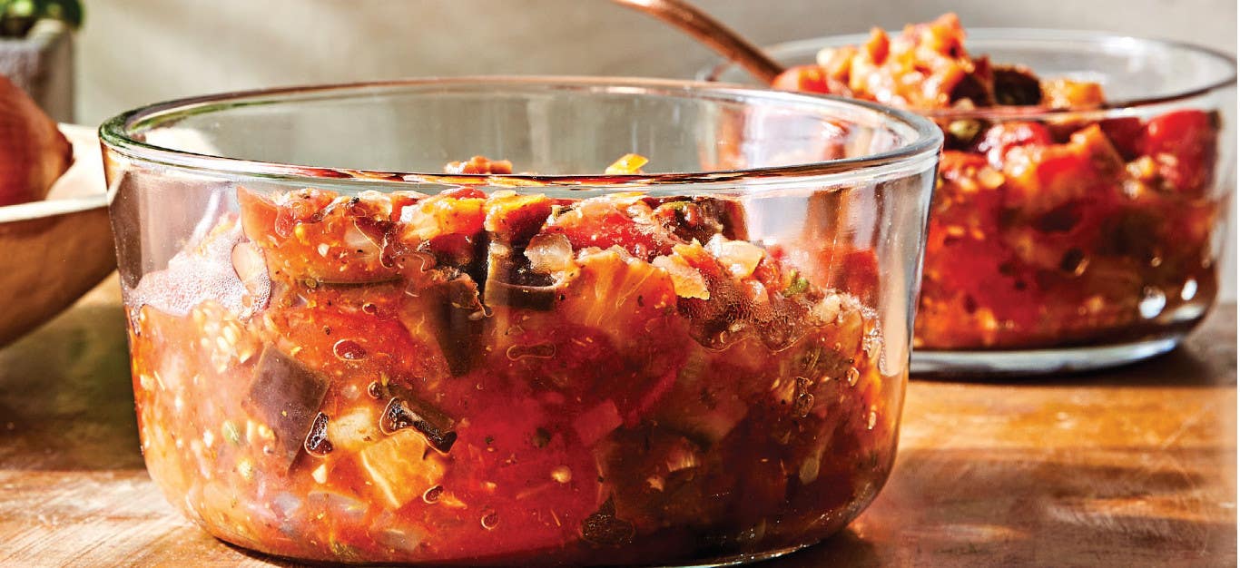 Sicilian Caponata in a glass bowl with another bowl of caponata in the background