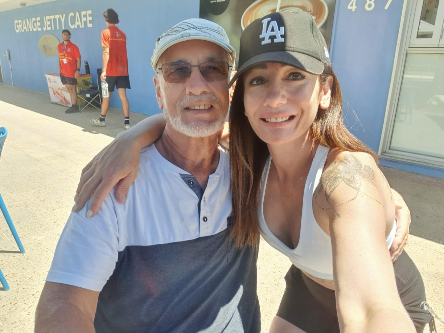 Rainer Lucks, who adopted a whole-food plant-based diet for heart disease and got off statins, poses with his daughter