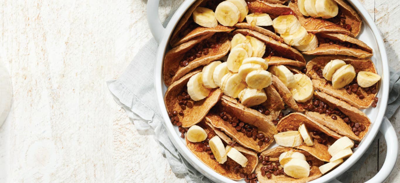 Banana Pancake Casserole with Chocolate Chips in a white 3-quart casserole dish