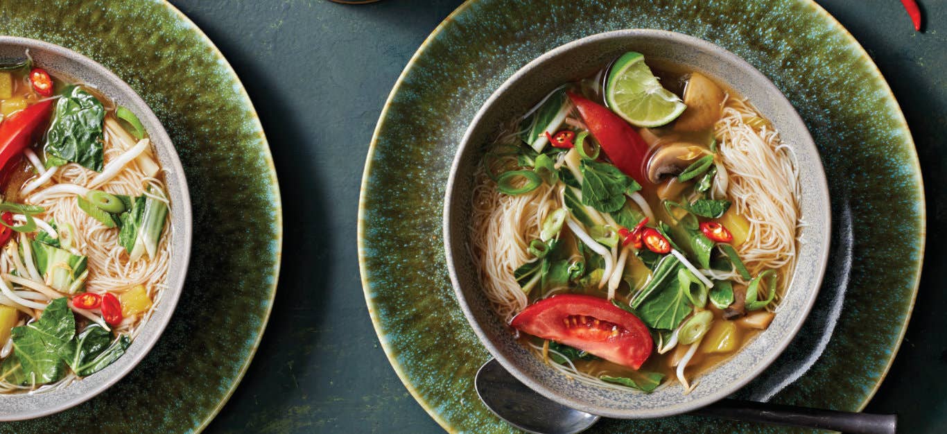 Two bowls of Vietnamese Tamarind, Pineapple, and Brown Rice Noodle Soup