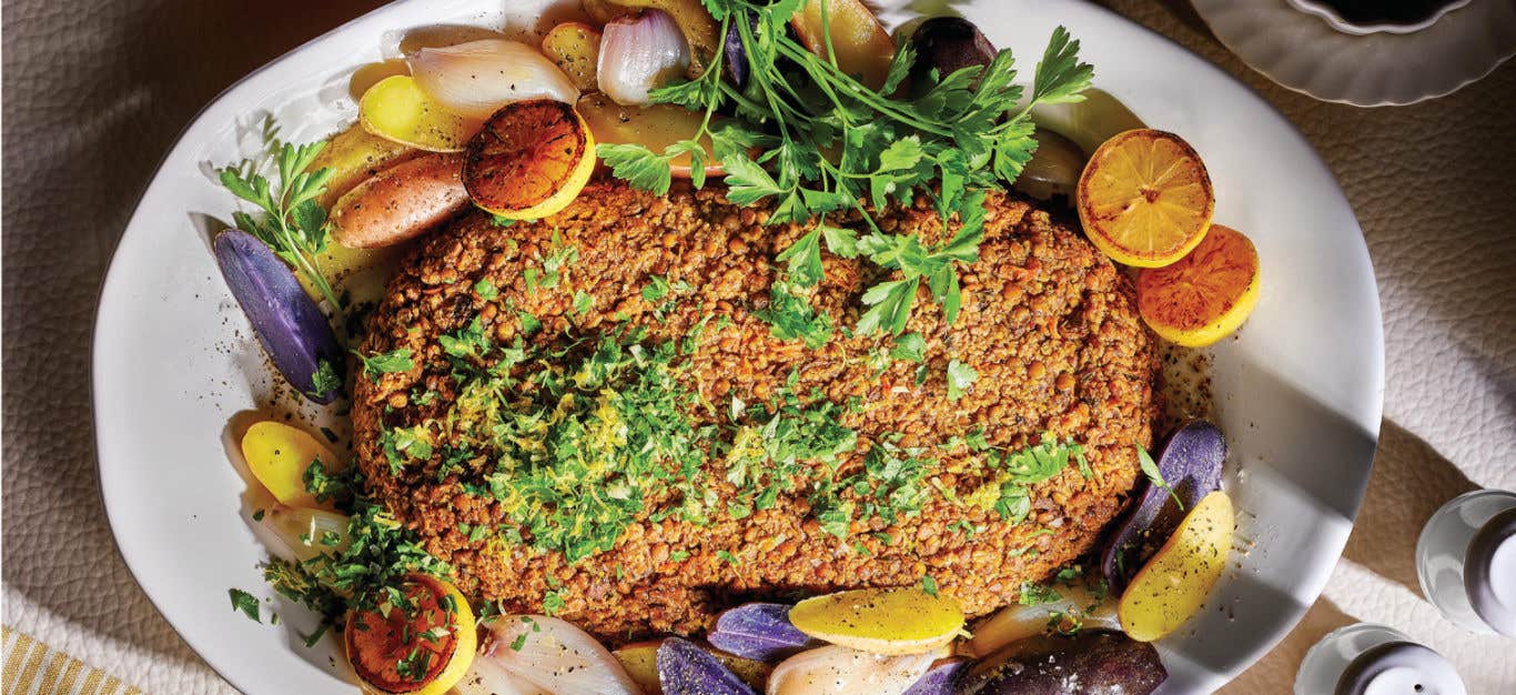 Millet-Lentil Vegan Thanksgivng Roast with Fingerling Potatoes on a platter