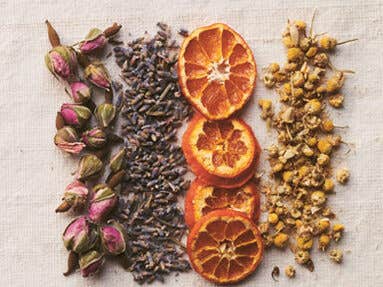 dried flowers herbs and other plant ingredients shown grouped together to create four tea blends by Pamela Anderson