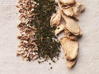 dried flowers herbs and other plant ingredients shown grouped together to create four tea blends by Pamela Anderson