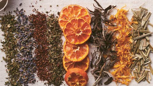 dried flowers herbs and other plant ingredients shown grouped together to create four tea blends by Pamela Anderson