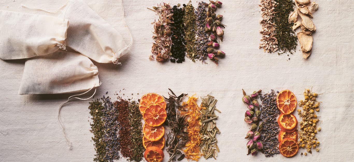 dried flowers herbs and other plant ingredients shown grouped together to create four tea blends by Pamela Anderson