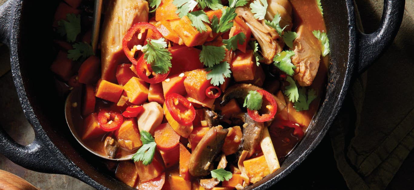 Five-Spice Sweet Potato and Jackfruit Stew in a cast-iron skillet