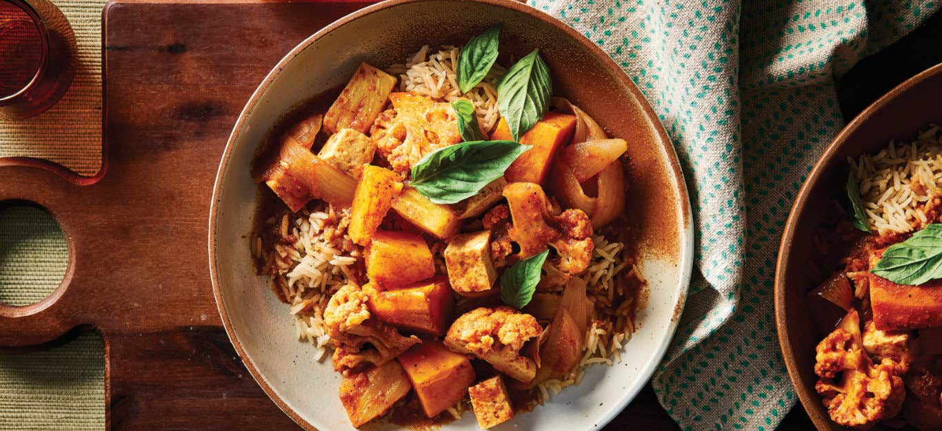 Two bowls of Thai Pineapple Curry with Sweet Potato and Tofu