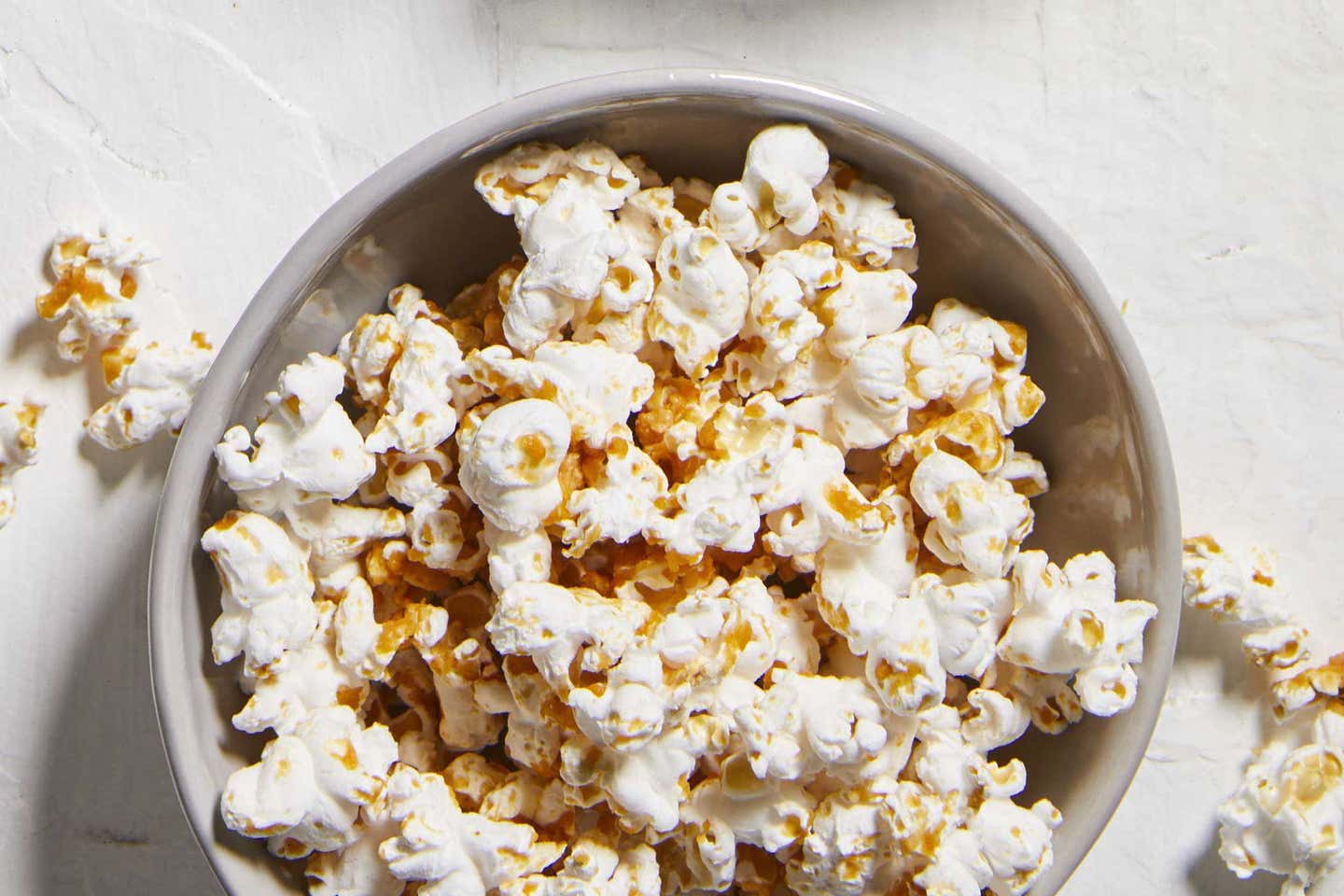 spicy peanut popcorn in a bowl