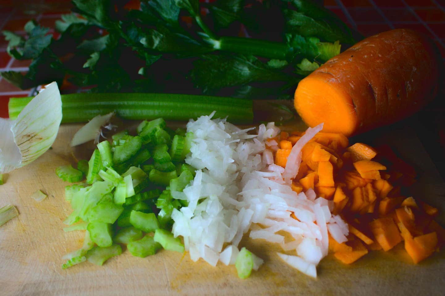 chopped celery, onion and carrots for mirepoix