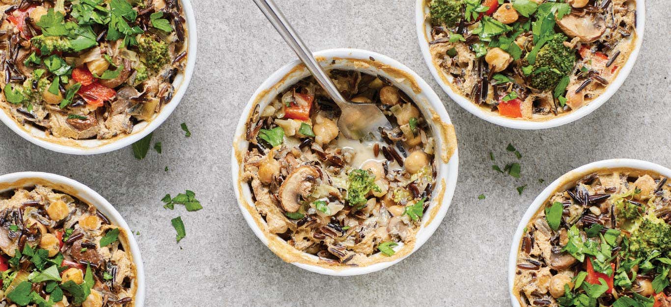 Individual Broccoli and Wild Rice Casseroles in white ramekins