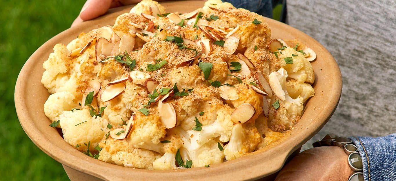 Creamy White Cauliflower Side Dish Topped with Almonds, Bread Crumbs