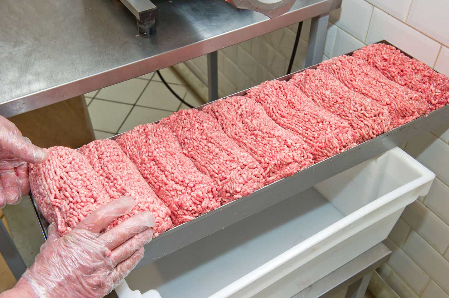 A large tray of raw ground beef