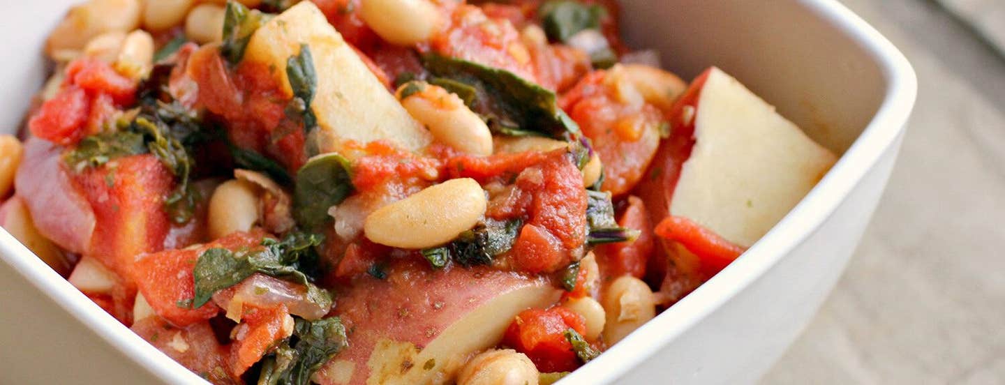 Italian White Bean, Kale and Potato Stew in a white bowl