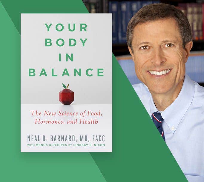 Neal Barnard next to a copy of his book "Your Body in Balance"