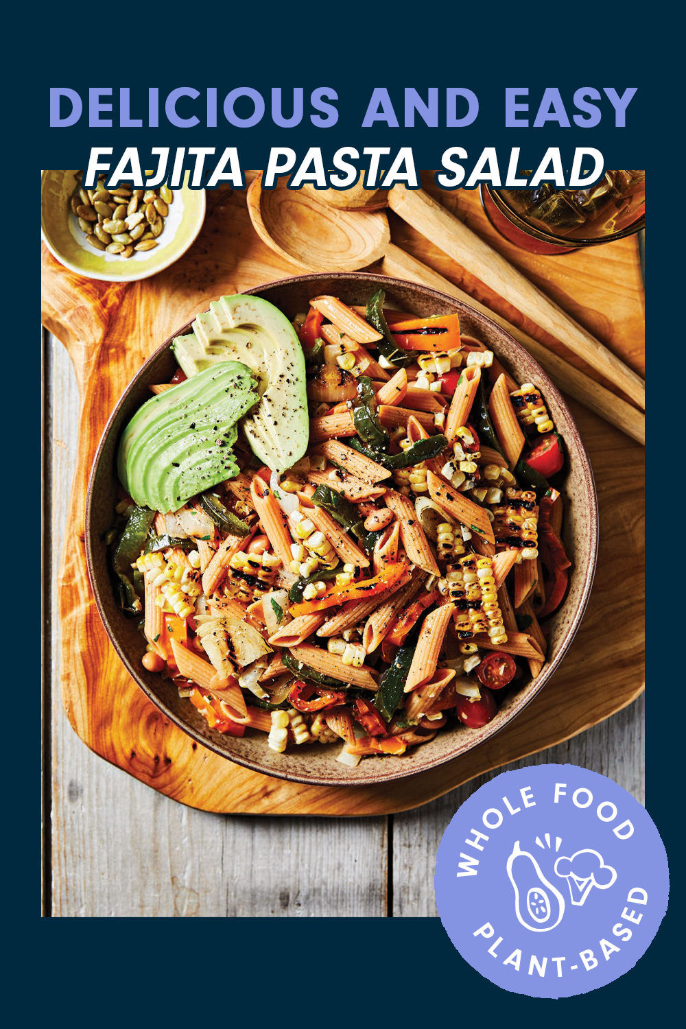 A colorful pasta salad garnished with sliced avocado sits on a wooden chopping board. Text reads, "Delicious and Easy Fajita Pasta Salad"