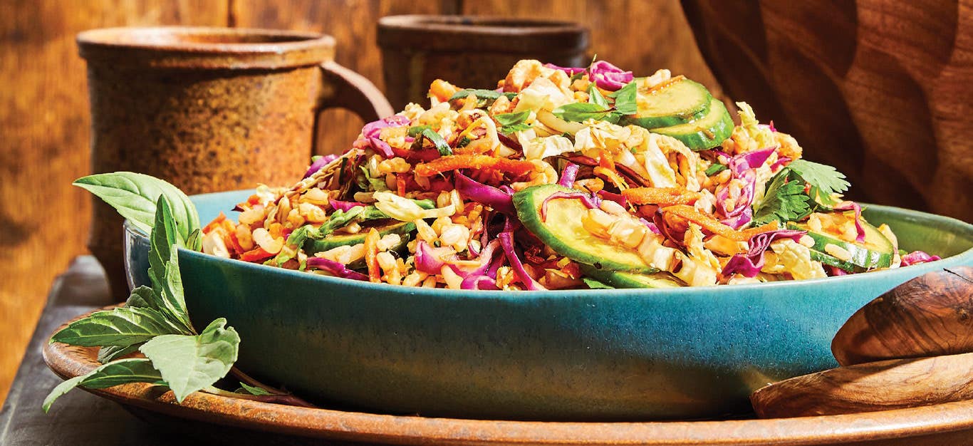 Thai Breakfast Salad in a teal ceramic serving bowl