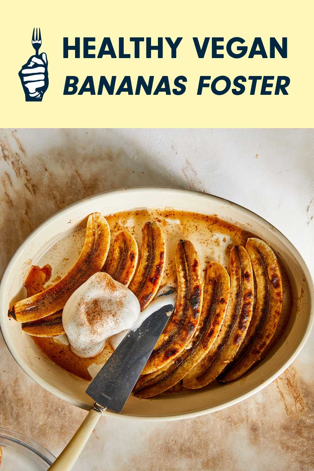 A white bowl of cooked bananas with text above that reads, "Healthy Vegan Bananas Foster"