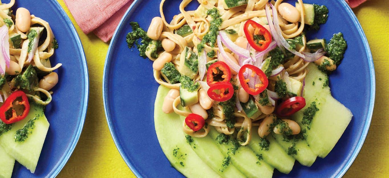 Thai Peanut Noodles with Fresh Melon and Lime Vinaigrette on blue plates