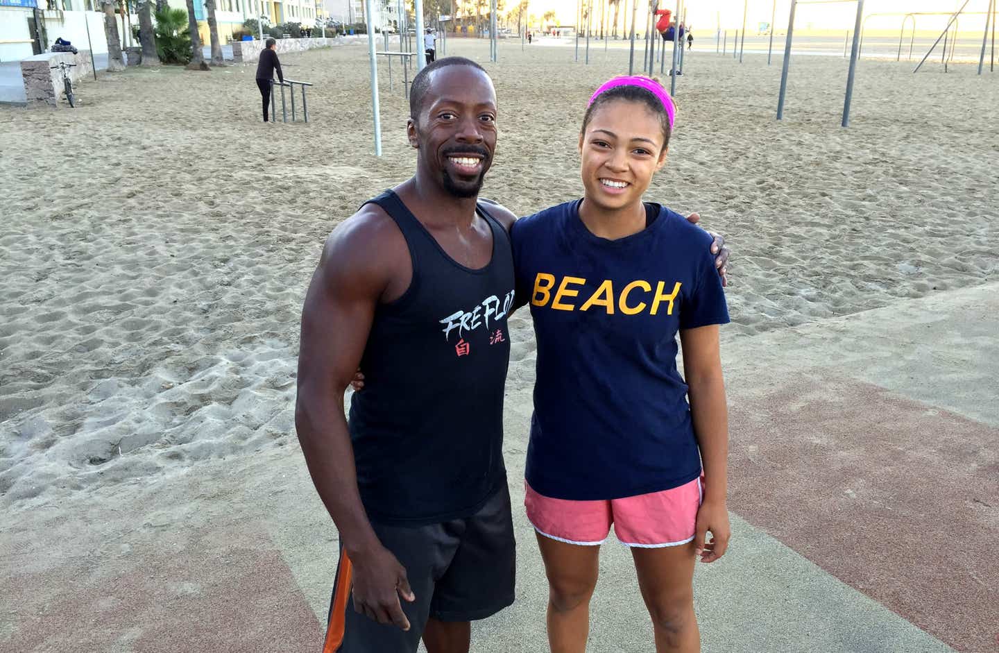 Keera-Kappel-Clark and her father at Venice beach wearing exercise clothing