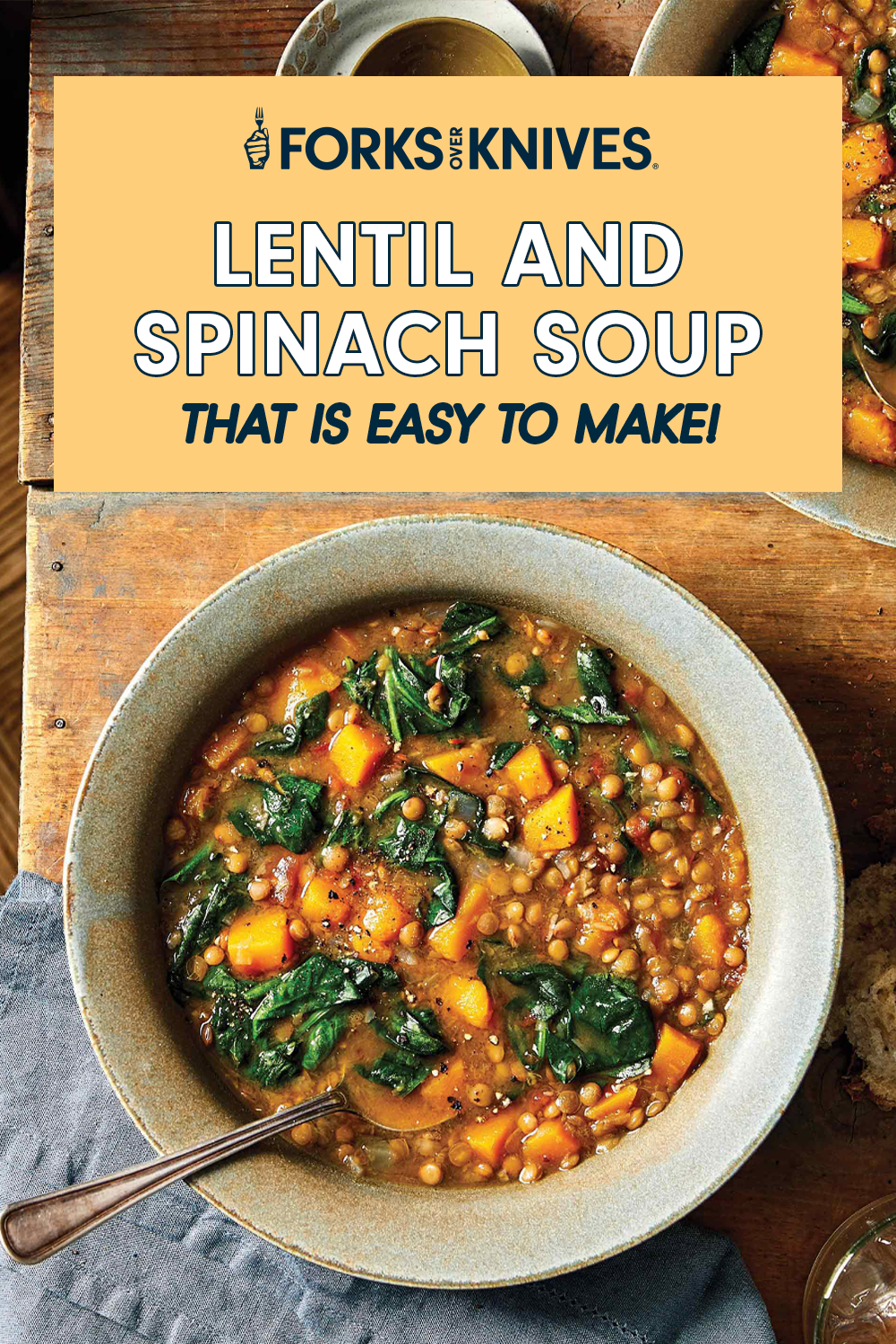 Lentil and Spinach Soup in a pottery bowl with a spoon resting on the side