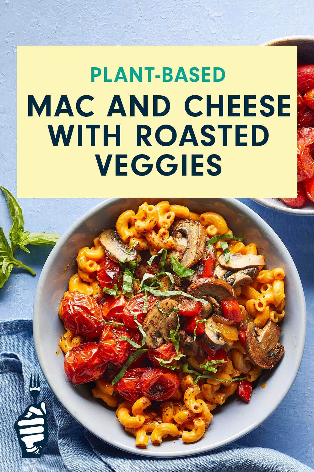 A bowl of Mac and Cheese with roasted cherry tomatoes and mushrooms against a blue background. A title reads, "Mac and Cheese with Roasted Veggies"