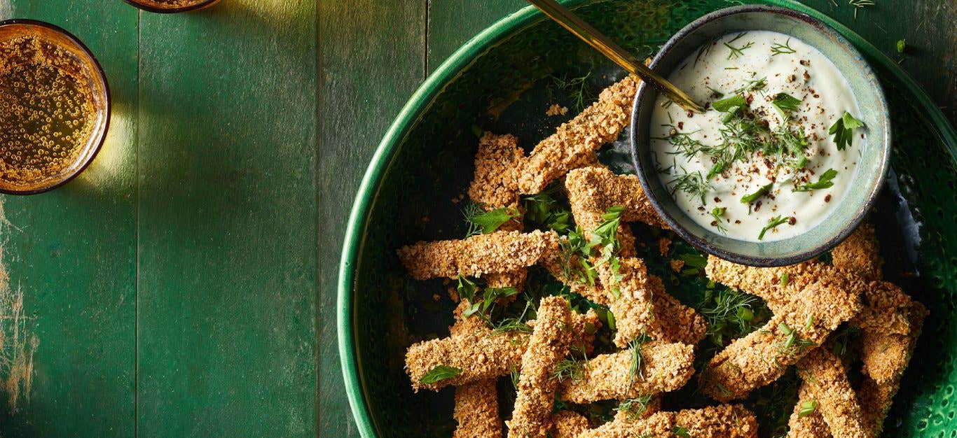 Nopales Fries with Dipping Sauce on a green plate