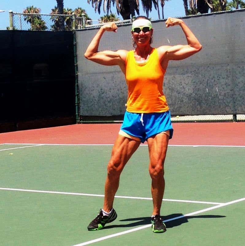 Suzanna McGee, former bodybuilding champion flexes her muscles on the tennis court to show how happy she is about a plant-based lifestyle.