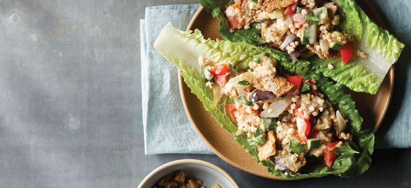 Roasted Eggplant and Buckwheat Groats Fattoush served on romaine lettuce leaves