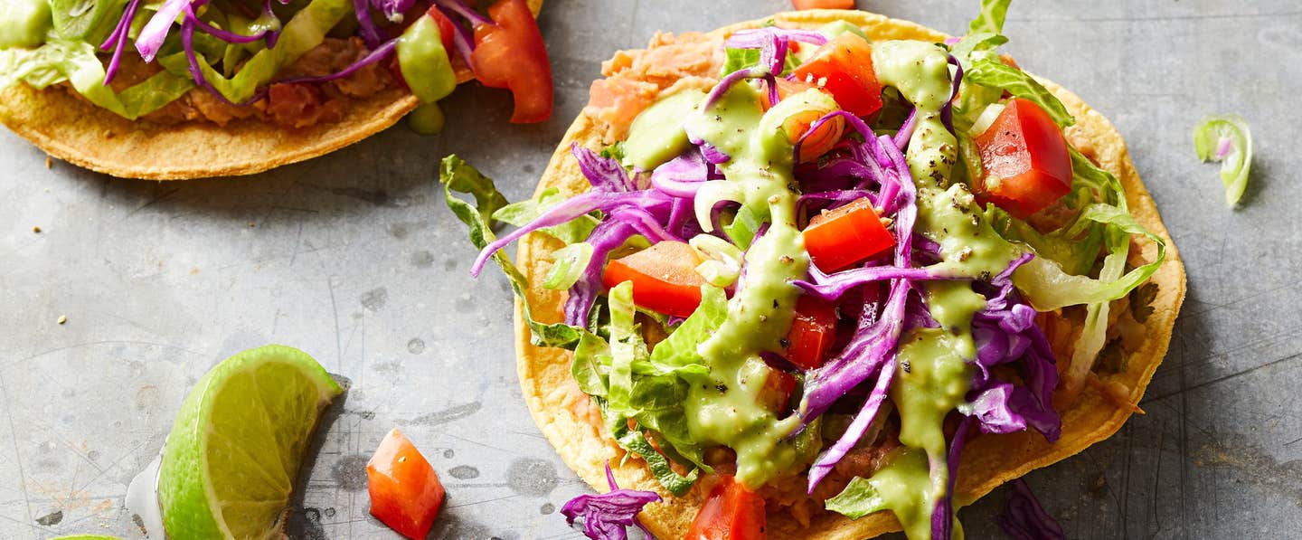 Crispy Southwest Chipotle Tostadas topped with healthy delicious vegan ingredients.