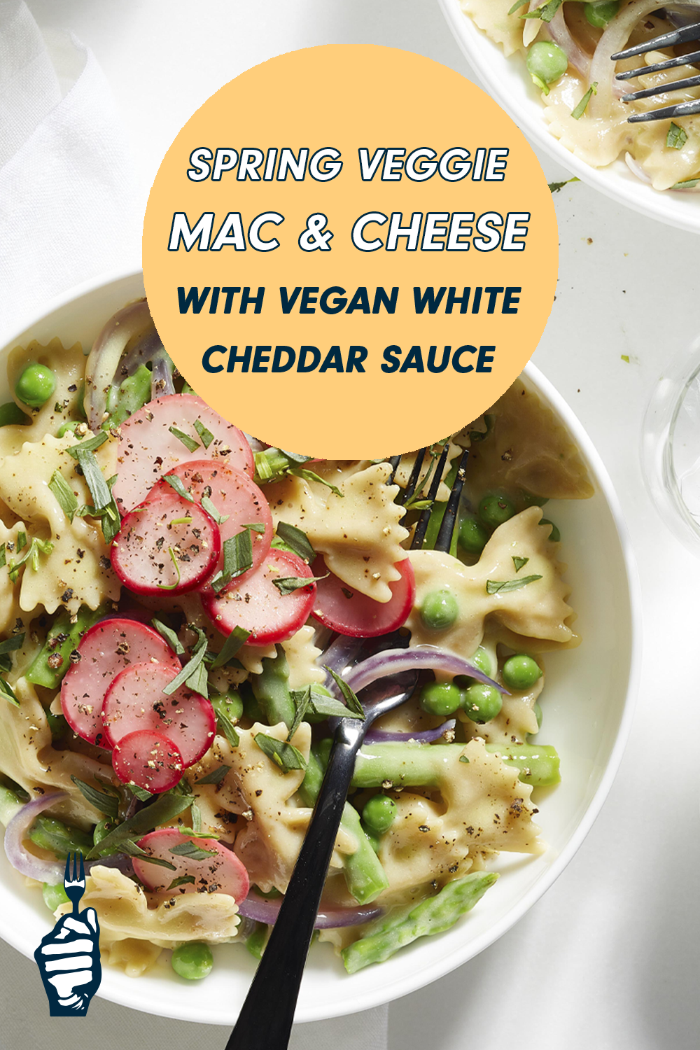 Spring Veggie Mac and Cheese with Vegan White Cheddar Sauce in a white bowl.