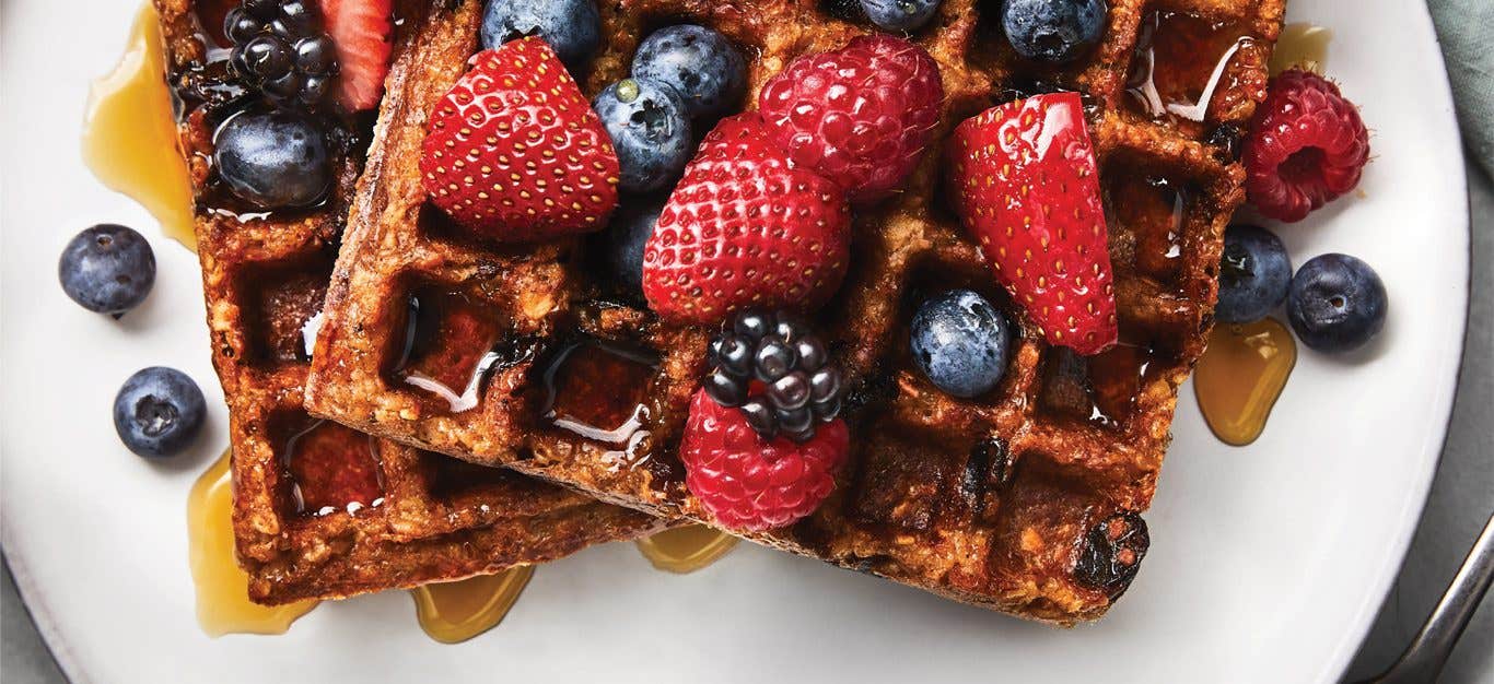 Waffled Maple-Cinnamon Oatmeal on a white plate with berries