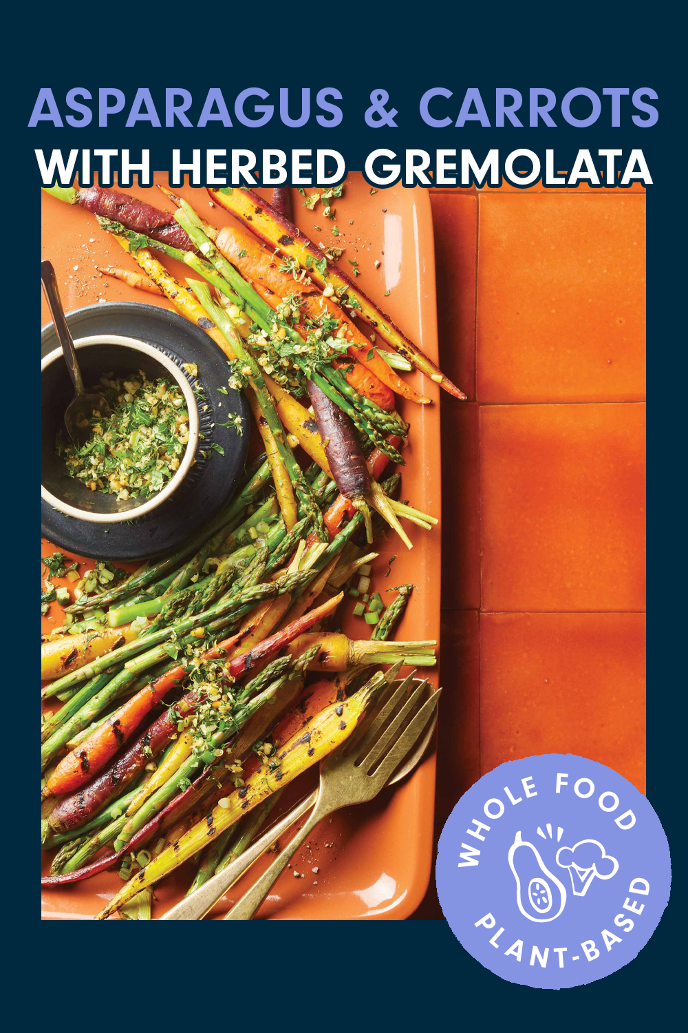 Baked asparagus and colorful carrots on an orange platter with a small bowl of herbs. Text reads, "Grilled Asparagus and Rainbow Carrots with Gremolata"