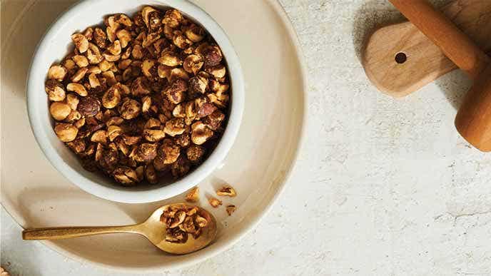 Cheesy Nut Crumbles in a white ceramic bowl