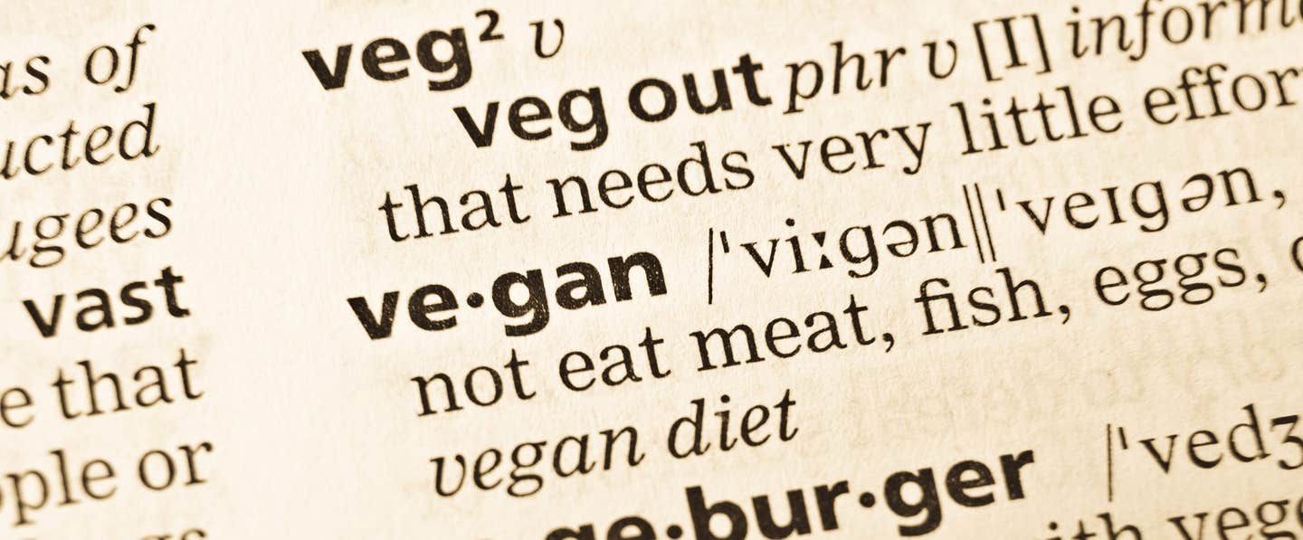 A close-up of the dictionary entry for the word "vegan"