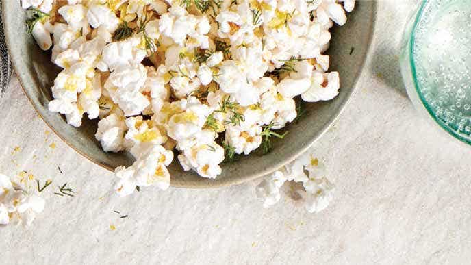 Pickle Popcorn in a beige ceramic bowl