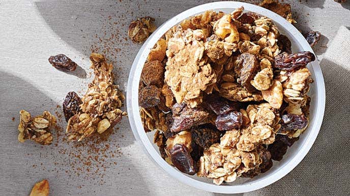 Cinnamon-Raisin Granola in a small white bowl