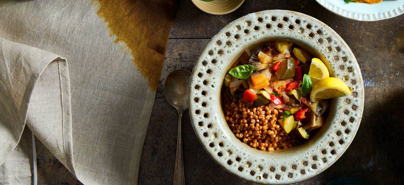 Slow Cooker Ratatouille Served in a White Bowl on Rustic Table