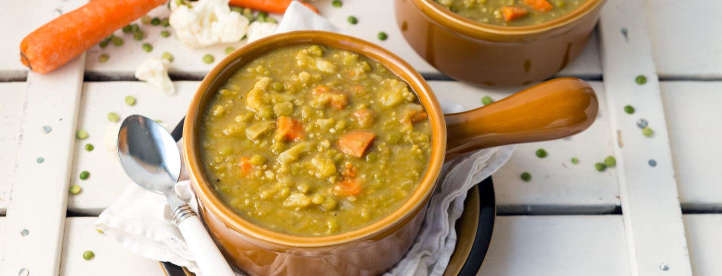 Split Pea & Cauliflower Soup in a brown, ceramic serving bowl with a handle