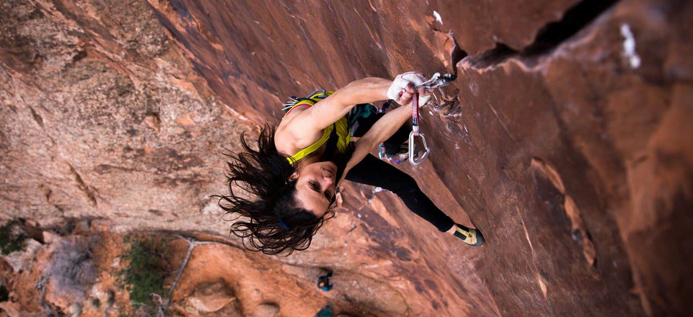 Rock Climber Steph Davis on a Steep Rockface, Rope Climbing